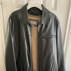 Wilson’s black leather jacket.